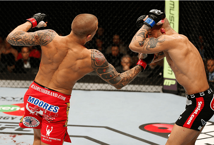 Dustin Poirier landing a big uppercut